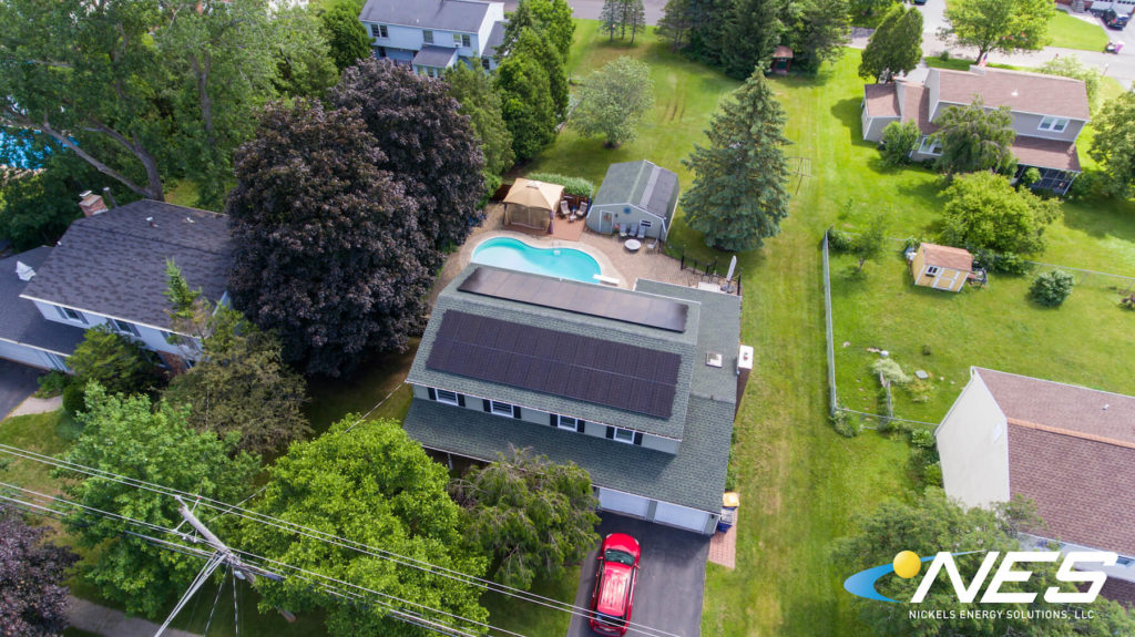 drone shot of solar panels on the roof